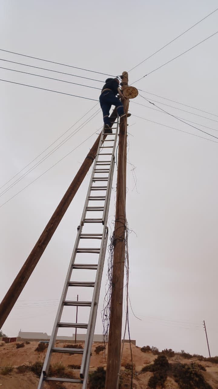 May be an image of 2 people and people climbing