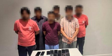 شرطة دبي تضبط  3 عصابات آسيوية انتحلت صفات جهات رسمية لسرقة الحسابات البنكية